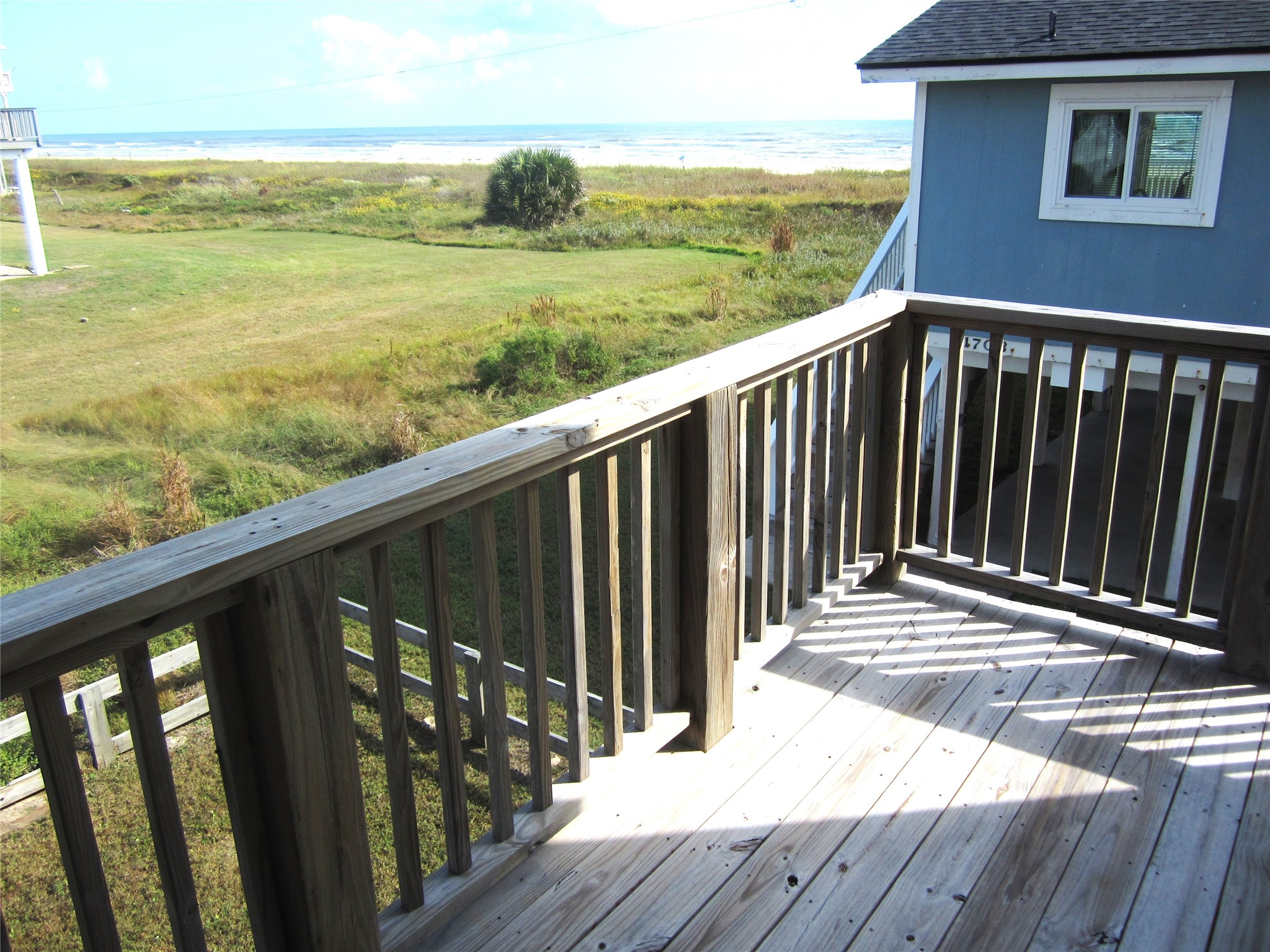21639 Termini-San Luis Pass Road Galveston, TX 77554 - Photo 20 of 33 Deck off of Primary Bedroom great for an evening glass of wine or?