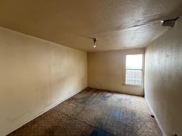 2204 R. W. Bivens Lane Fort Worth, TX 76105 - Photo 6 of 8 an empty room with windows