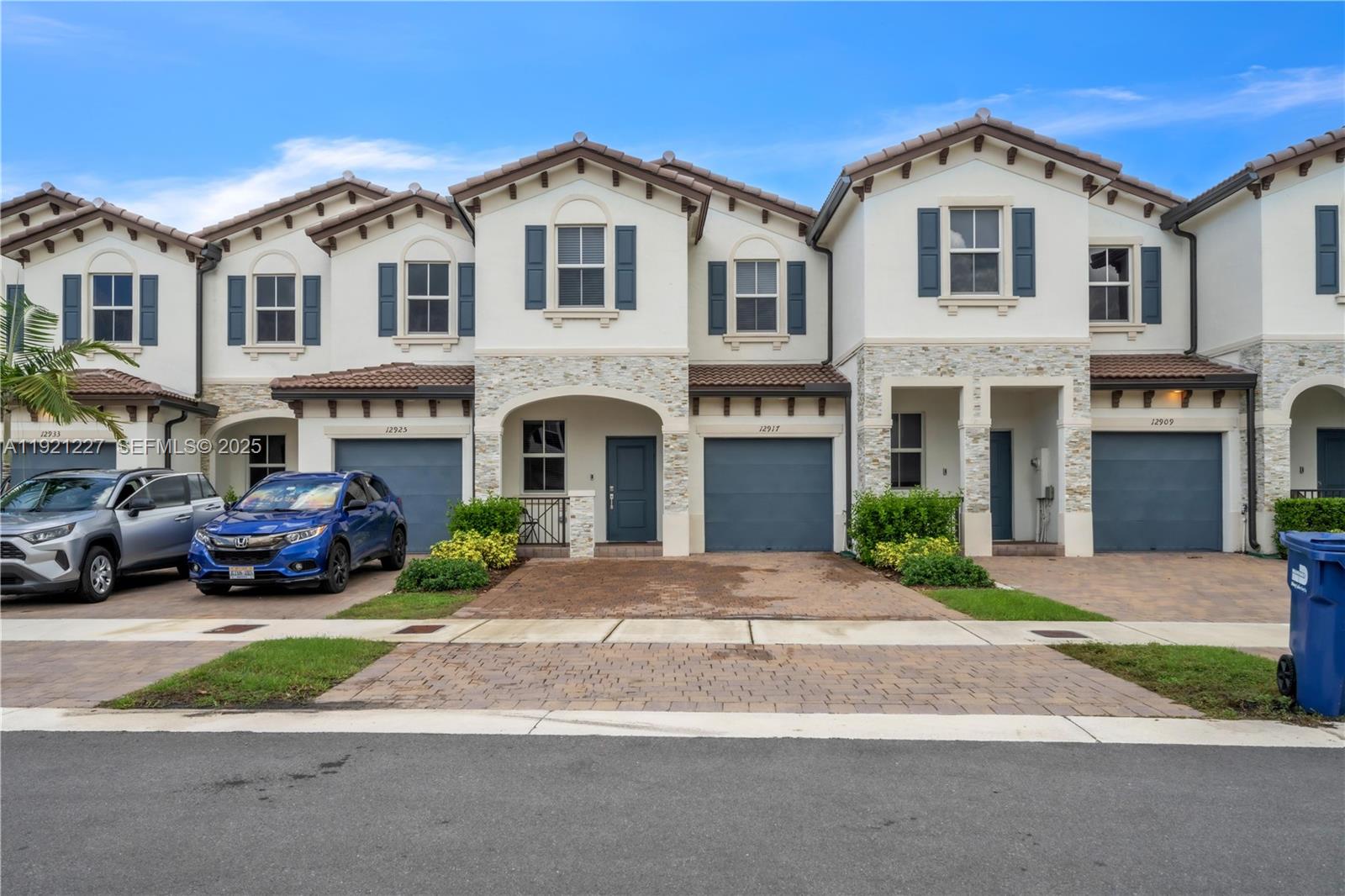 12917 Northwest 23rd Place Miami, FL 33147 - Photo 1 of 43 a front view of a residential houses