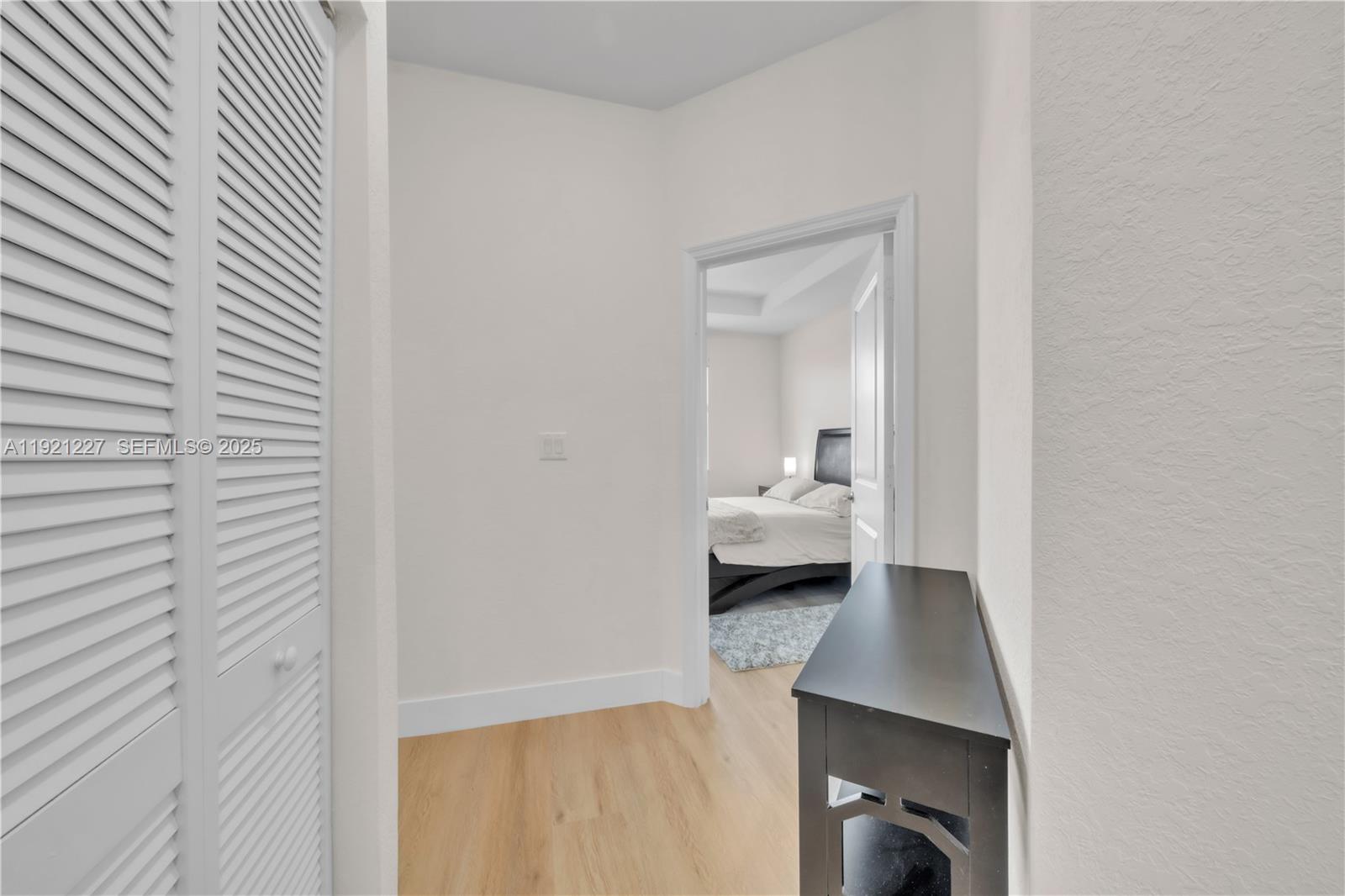 12917 Northwest 23rd Place Miami, FL 33147 - Photo 19 of 43 a close view of a utility room with washer and dryer