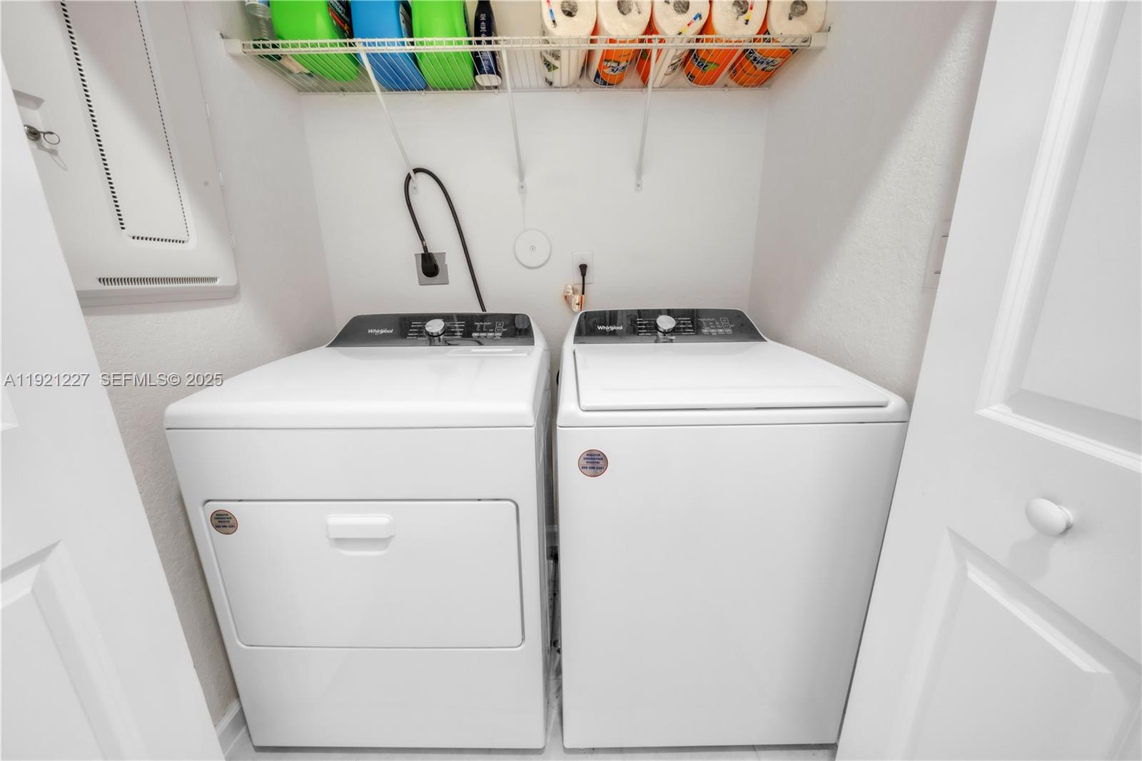 12917 Northwest 23rd Place Miami, FL 33147 - Photo 33 of 43 a utility room with dryer and washer