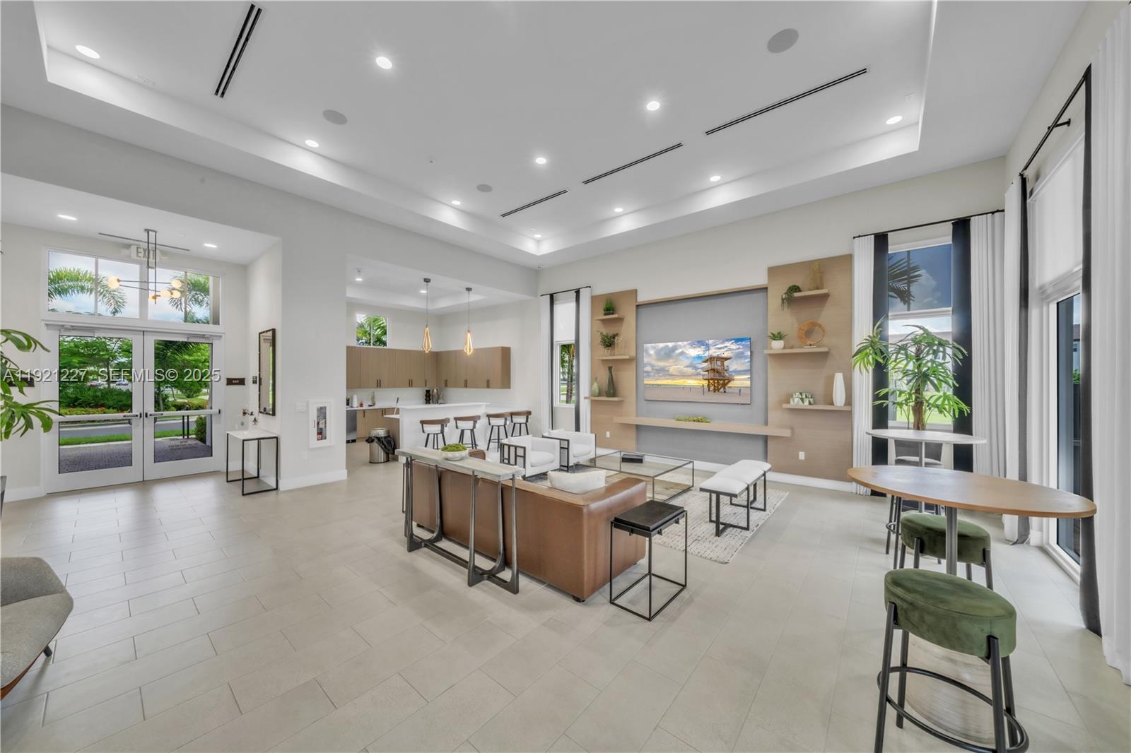 12917 Northwest 23rd Place Miami, FL 33147 - Photo 38 of 43 a living room with furniture and a large window