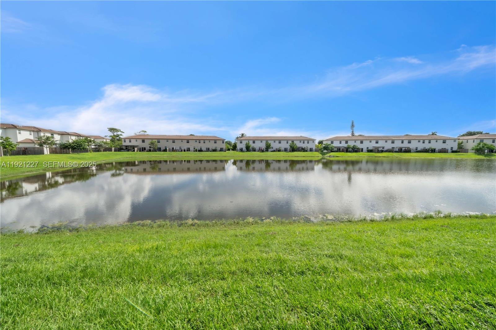 12917 Northwest 23rd Place Miami, FL 33147 - Photo 5 of 43 a view of a lake