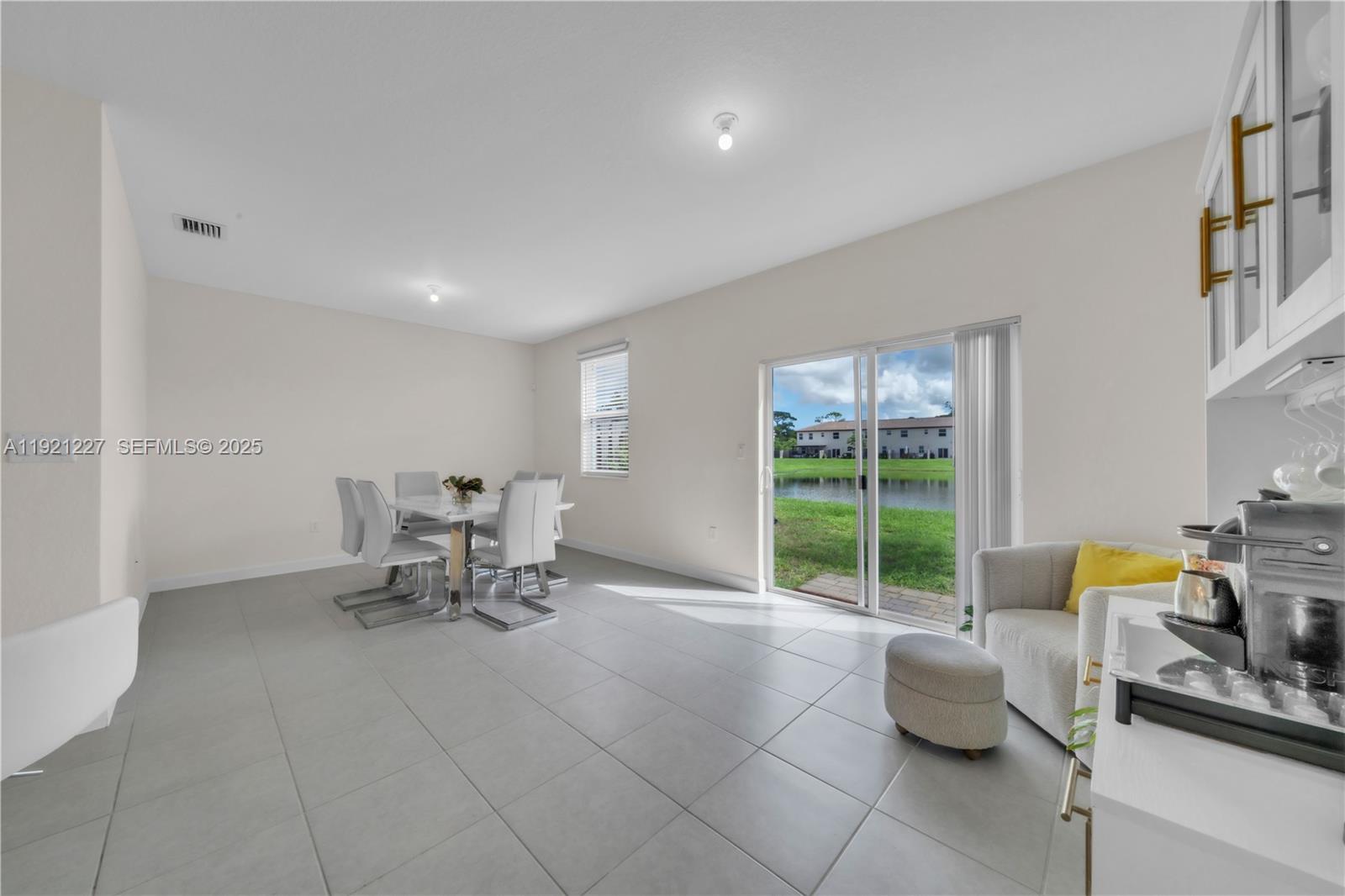 12917 Northwest 23rd Place Miami, FL 33147 - Photo 9 of 43 a view of a livingroom with furniture and a window