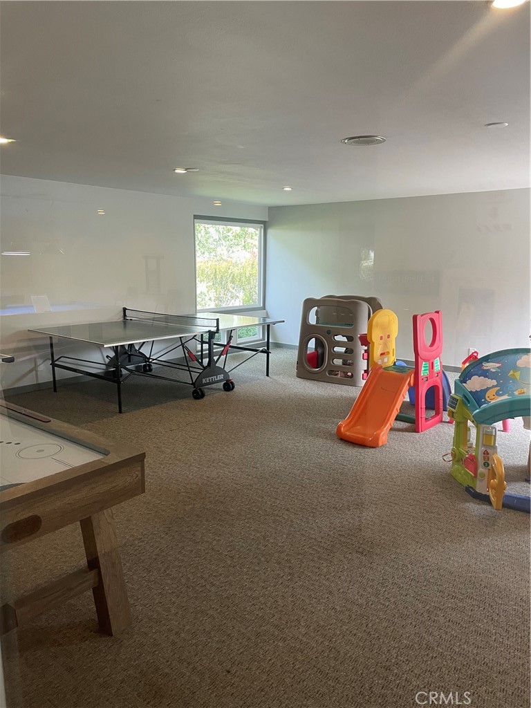 1550 Rimpau, Unit 147 Corona, CA 92881 - Photo 17 of 17 a view of a room with gym equipment