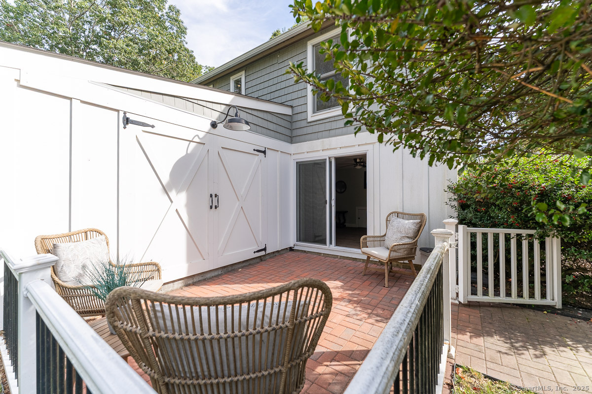 147 Pequot Avenue Groton, CT 06355 - Photo 19 of 40 Casual outdoor seating accessed from the apartment sliders.