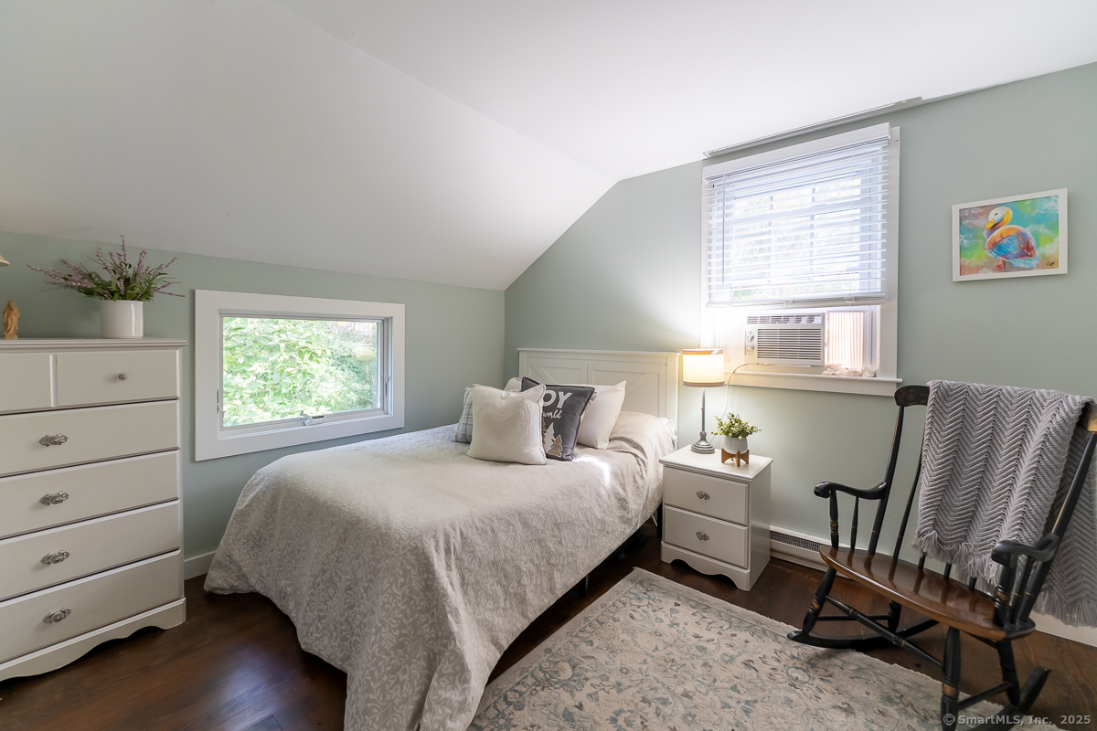 147 Pequot Avenue Groton, CT 06355 - Photo 28 of 40 Guest bedroom on the upper level with hardwood flooring.