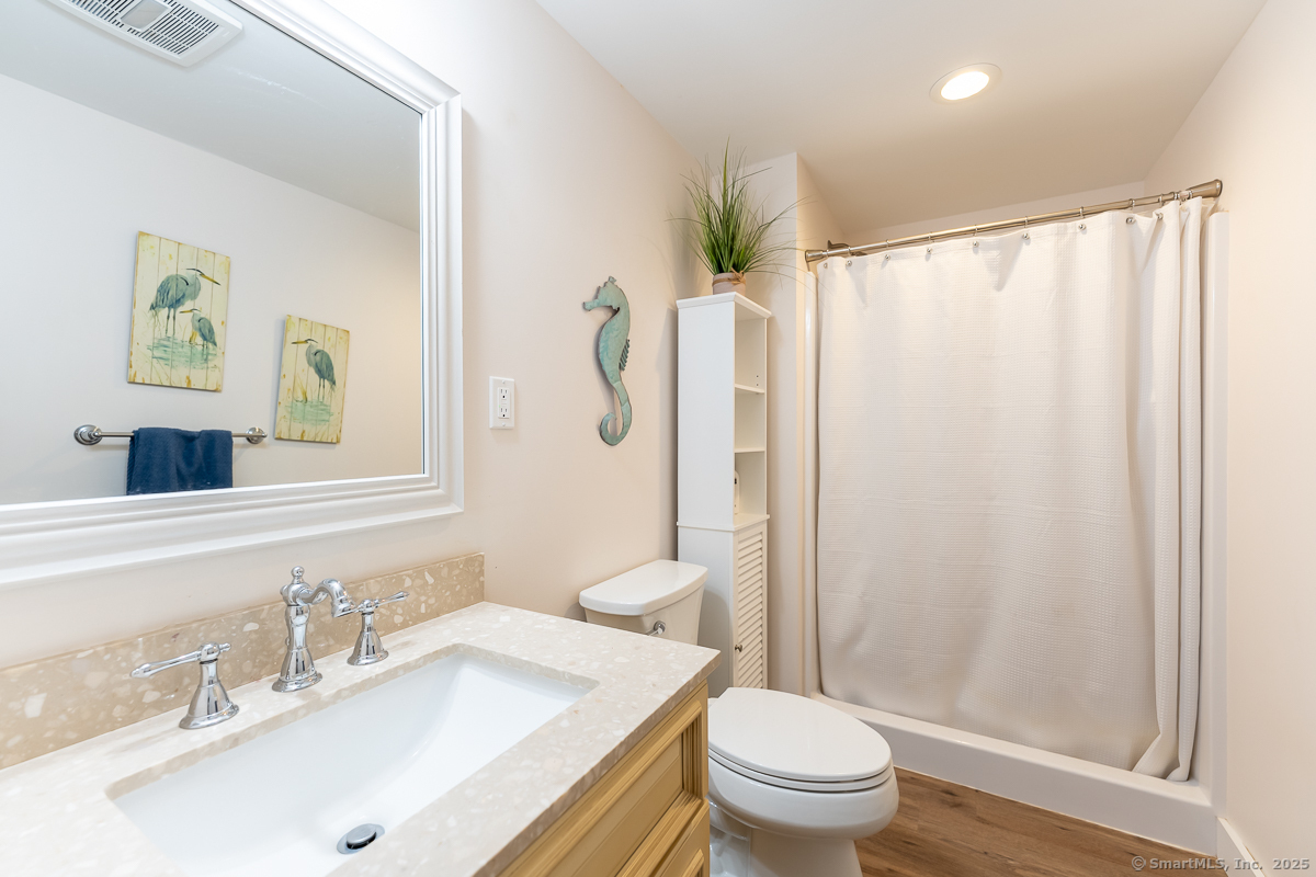 147 Pequot Avenue Groton, CT 06355 - Photo 32 of 40 Apartment bathroom on lower level adjacent to kitchen.