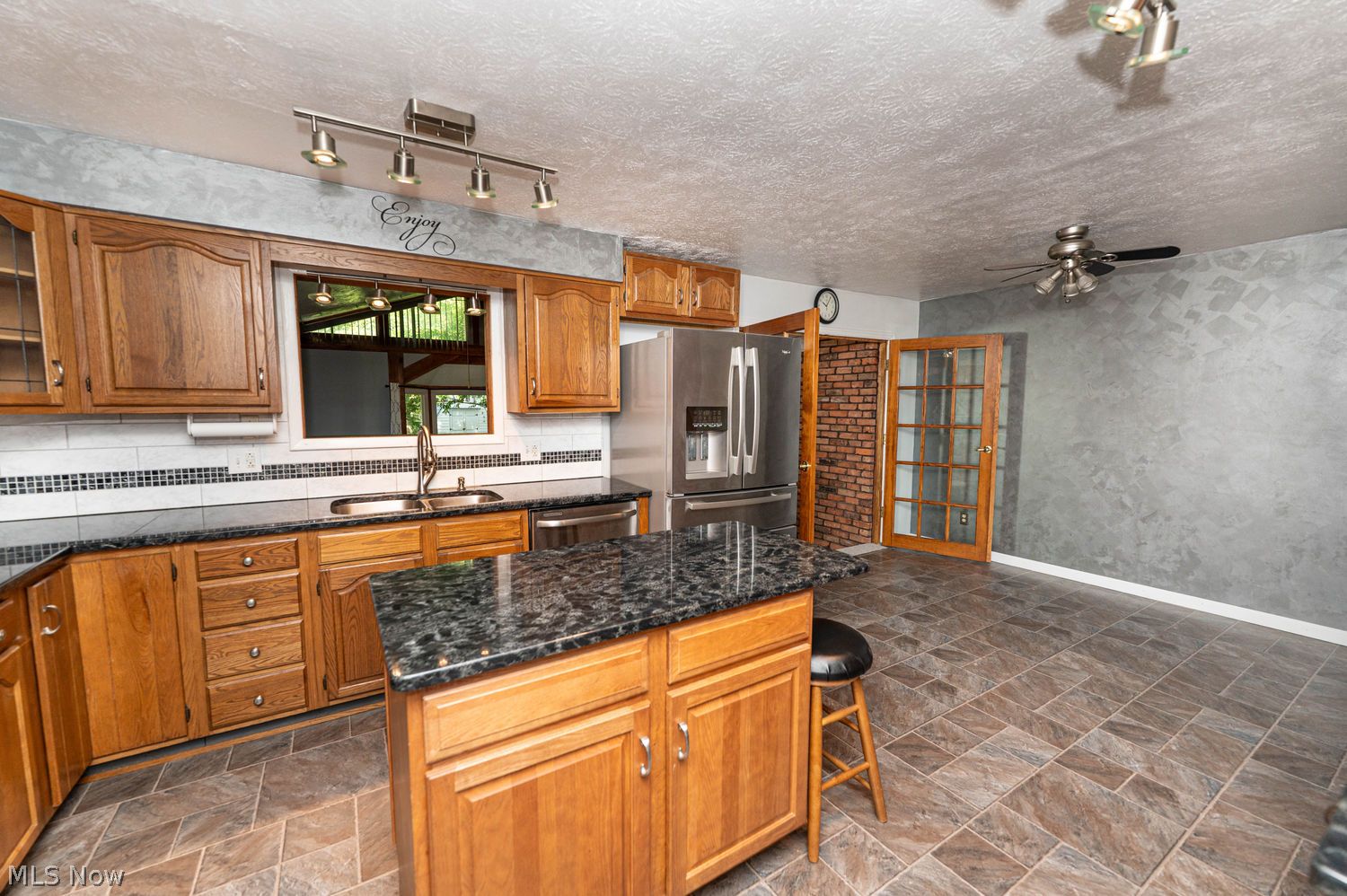916 Center Road Eastlake, OH 44095 - Photo 5 of 39 Incredibly appointed eat-in kitchen features granite counters and center island with breakfast bar