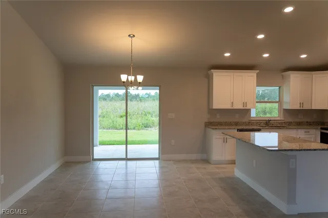 $1,600 | 409 Moore Avenue, Lehigh Acres, FL 33972