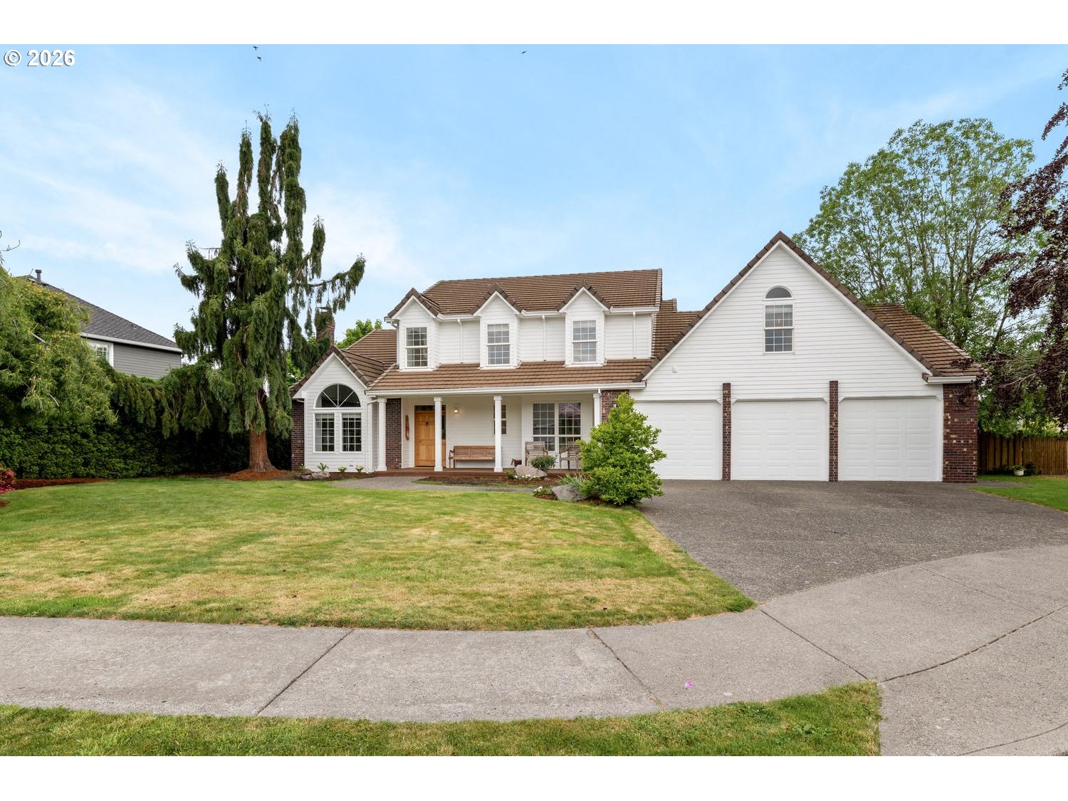 2519 Northwest 24th Circle Camas, WA 98607 - Photo 2 of 48 a front view of a house with a garden