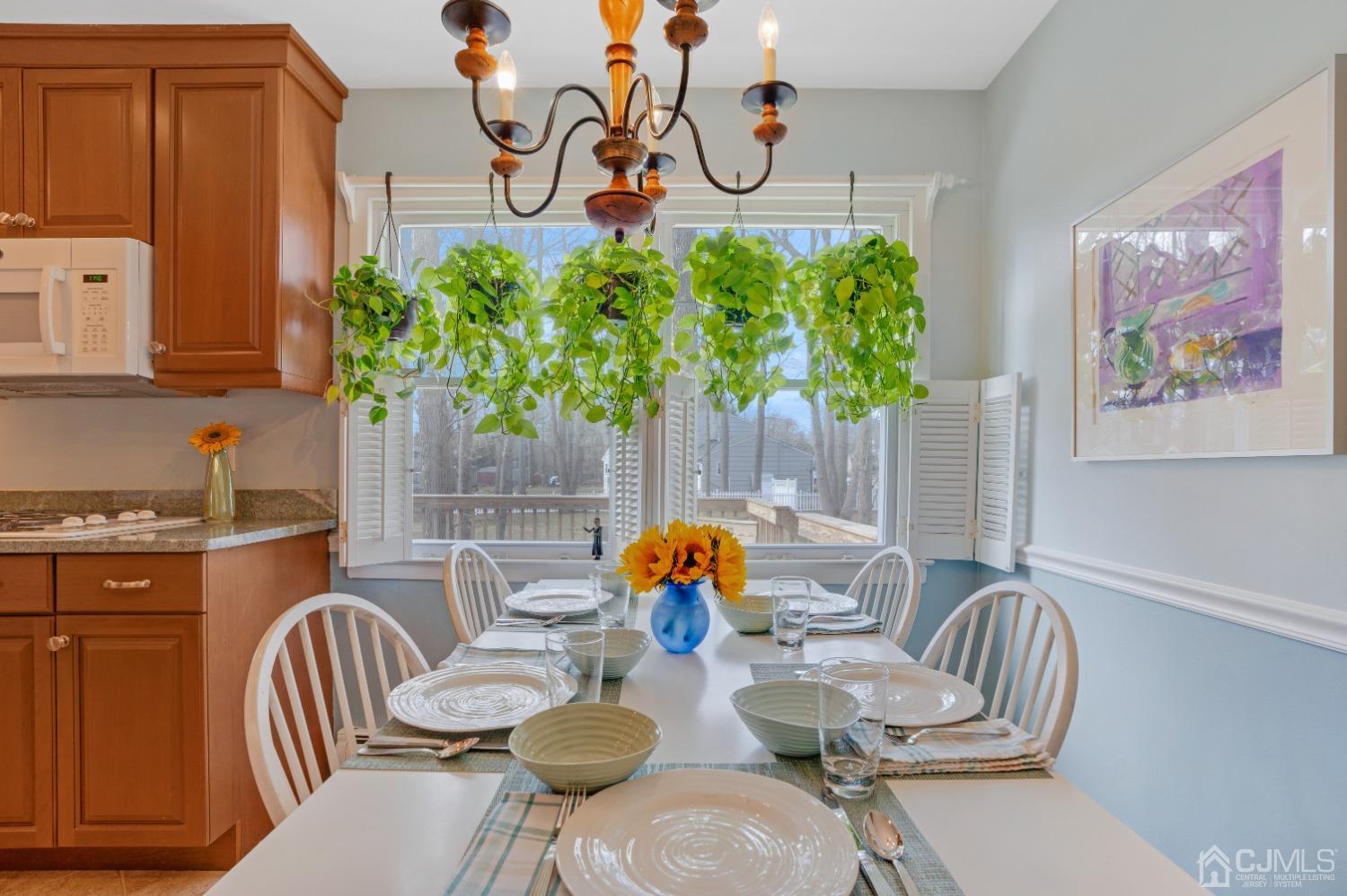 19 Warwick Road Edison, NJ 08820 - Photo 15 of 43 a dining room with furniture and wooden floor