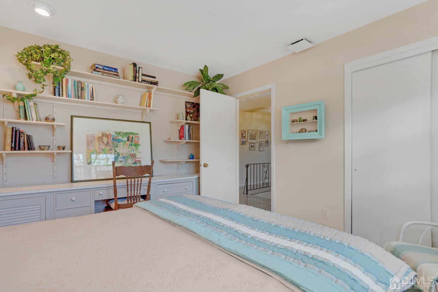 19 Warwick Road Edison, NJ 08820 - Photo 30 of 43 a bedroom with a bed and a cabinets
