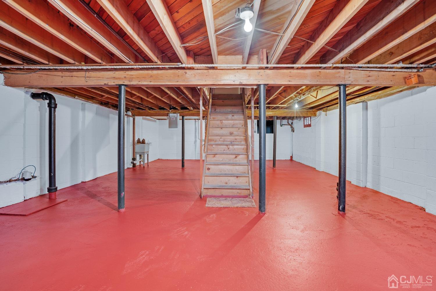 19 Warwick Road Edison, NJ 08820 - Photo 34 of 43 a view of an empty room with wooden floor