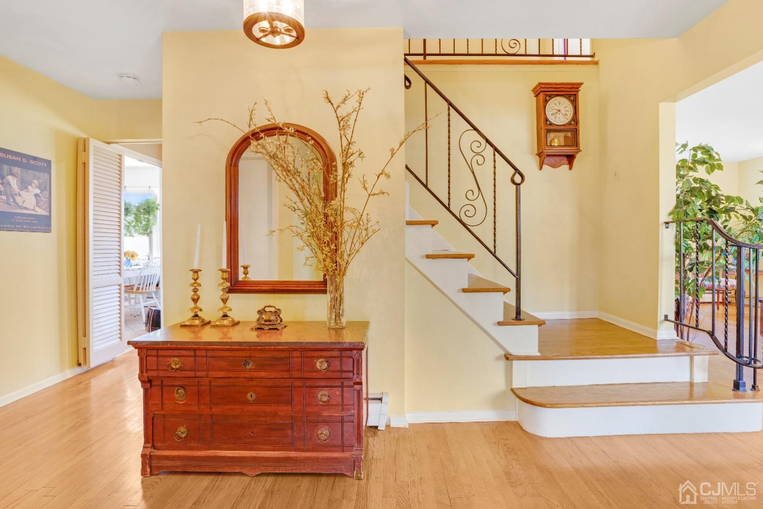 19 Warwick Road Edison, NJ 08820 - Photo 6 of 43 a view of entryway and hall with wooden floor