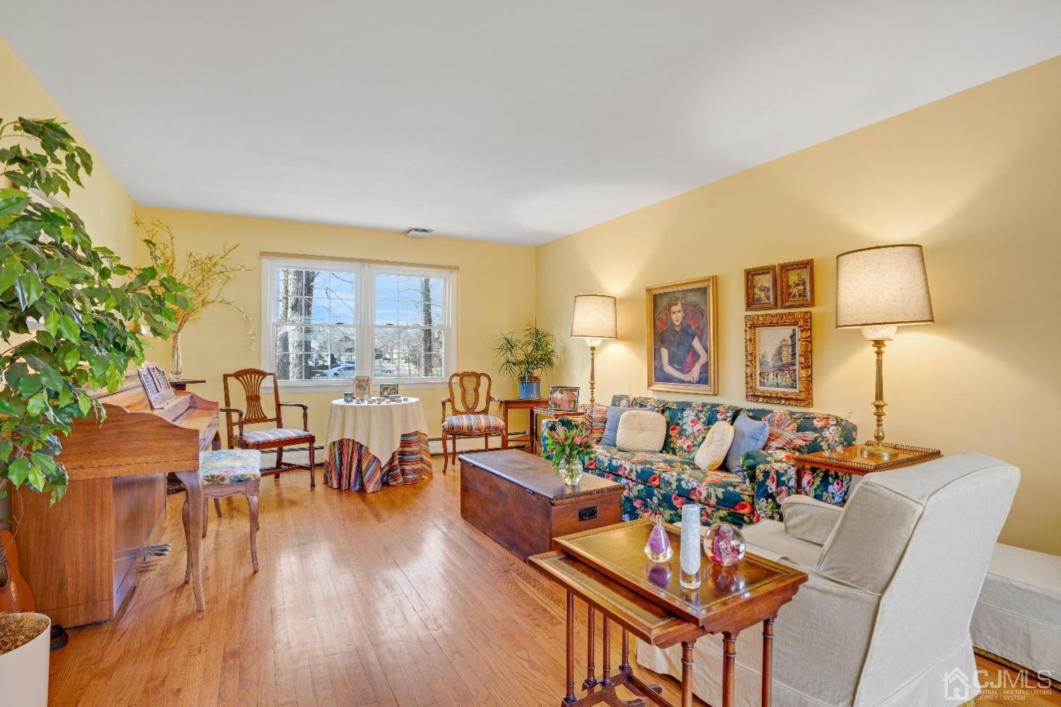 19 Warwick Road Edison, NJ 08820 - Photo 7 of 43 a view of a dining room with furniture window and wooden floor