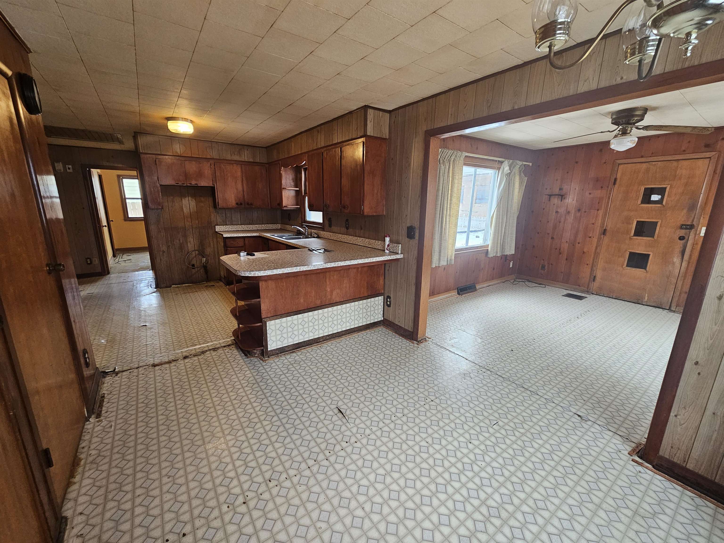 907 Merrill Avenue Loves Park, IL 61111 - Photo 14 of 15 a view of living room with furniture and a flat screen tv