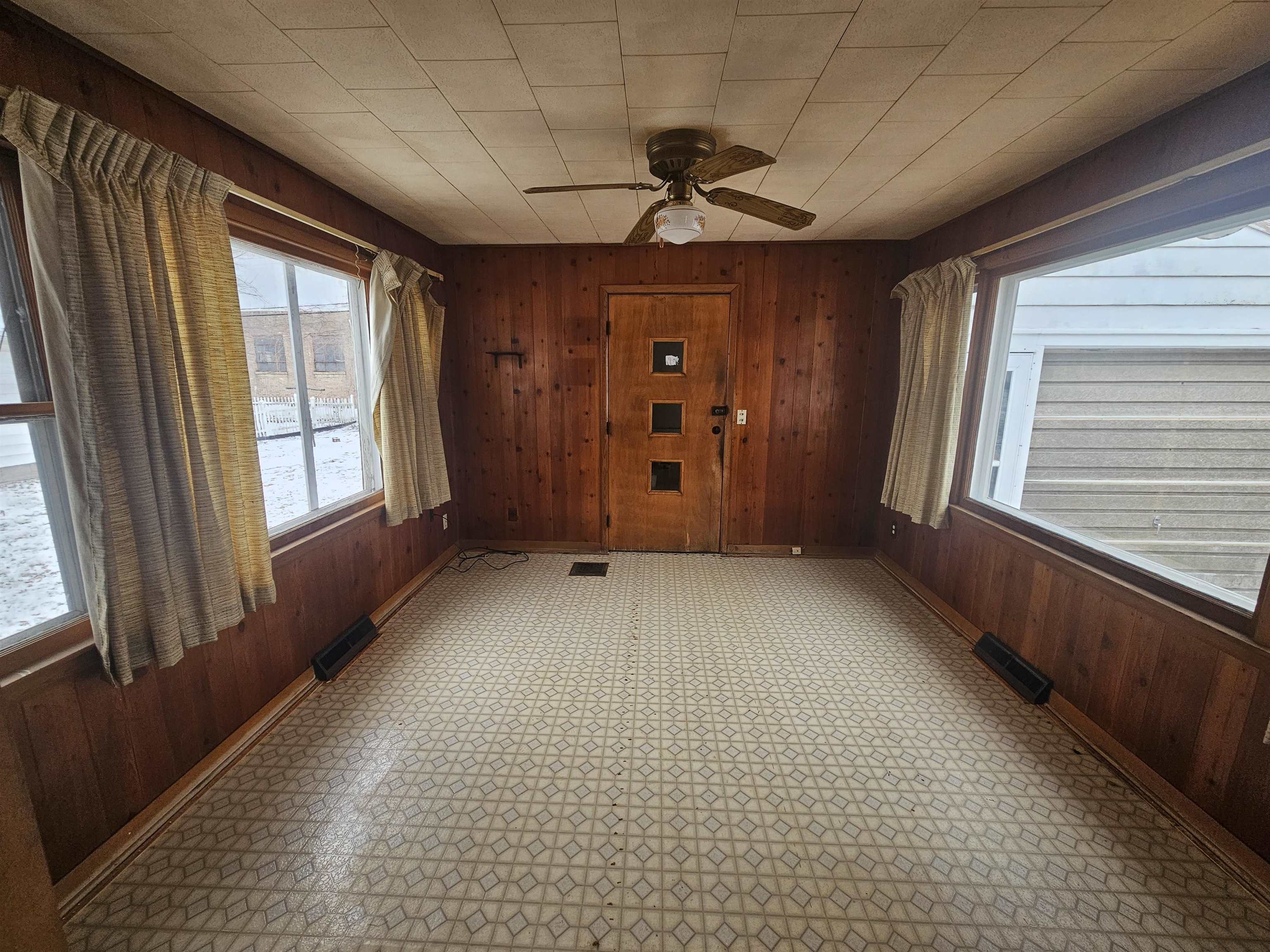 907 Merrill Avenue Loves Park, IL 61111 - Photo 10 of 15 a view of an empty room with a window