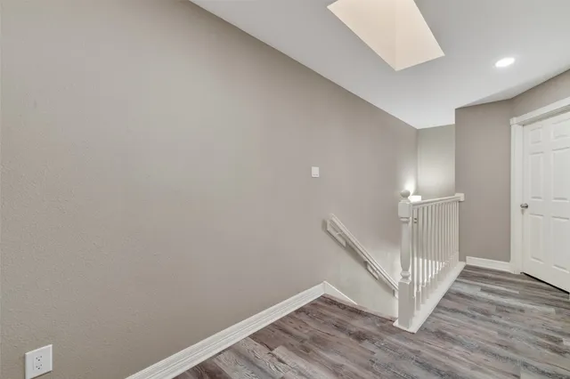 a view of a livingroom with wooden floor