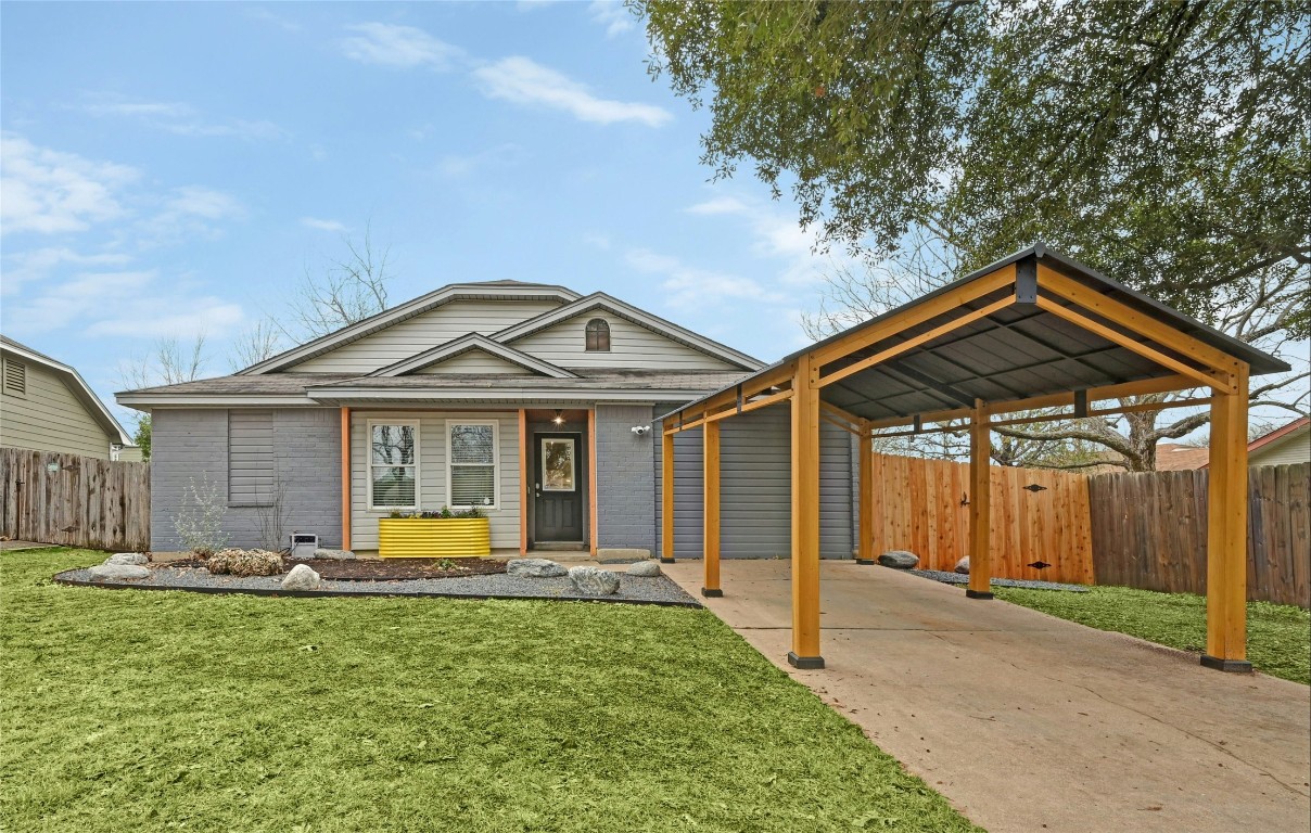 8527 Cornwall Drive Austin, TX 78748 - Photo 1 of 1 a front view of a house with garden