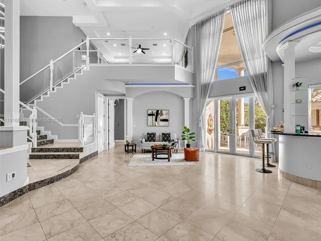 a lobby with furniture and windows