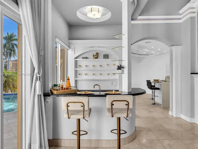 a living room with furniture and window