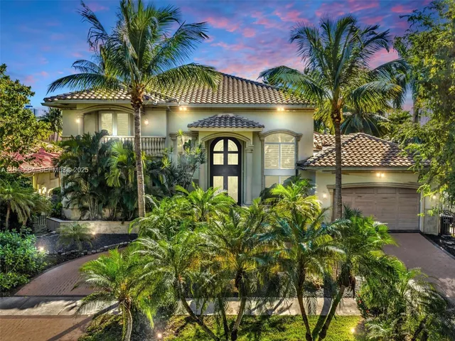 a view of a house with a swimming pool