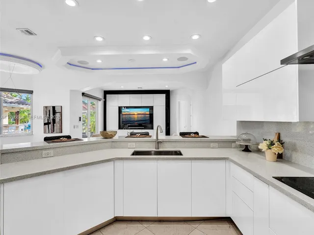 a bedroom with two beds and a couch