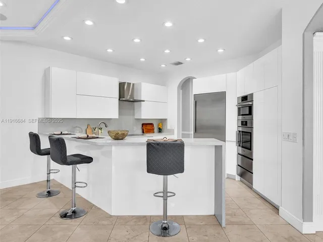 a bathroom with a toilet and a bathtub