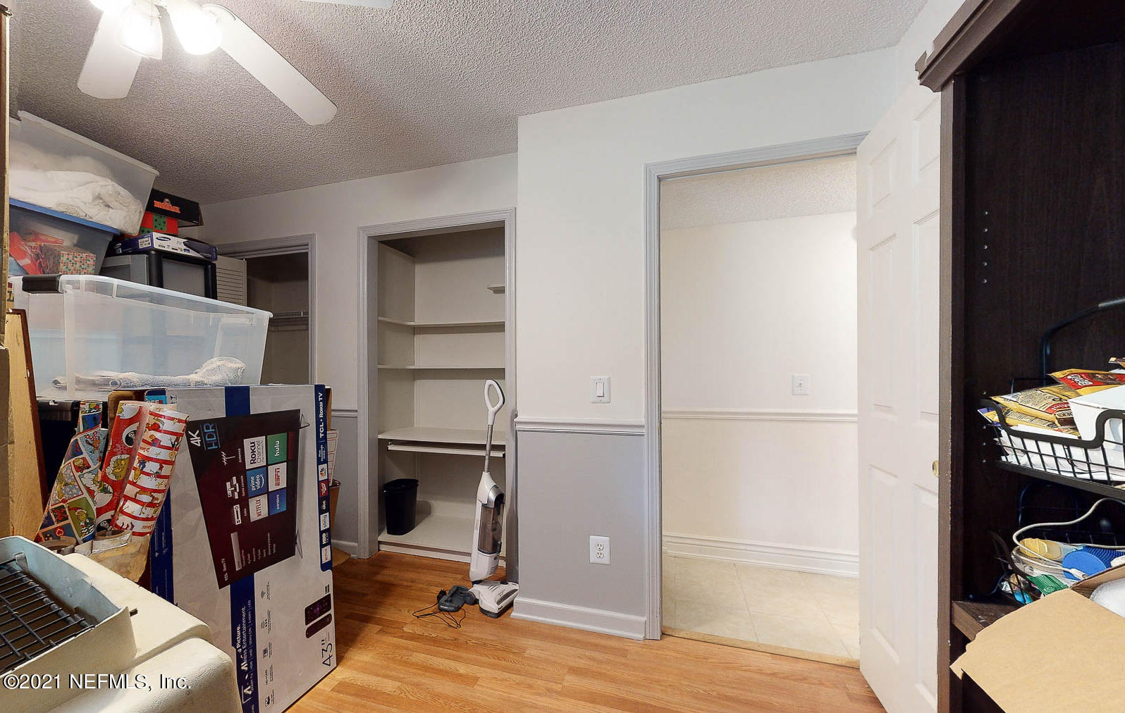 2053 Cornell Road Middleburg, FL 32068 - Photo 20 of 38 a view of a living room with a bed and a window