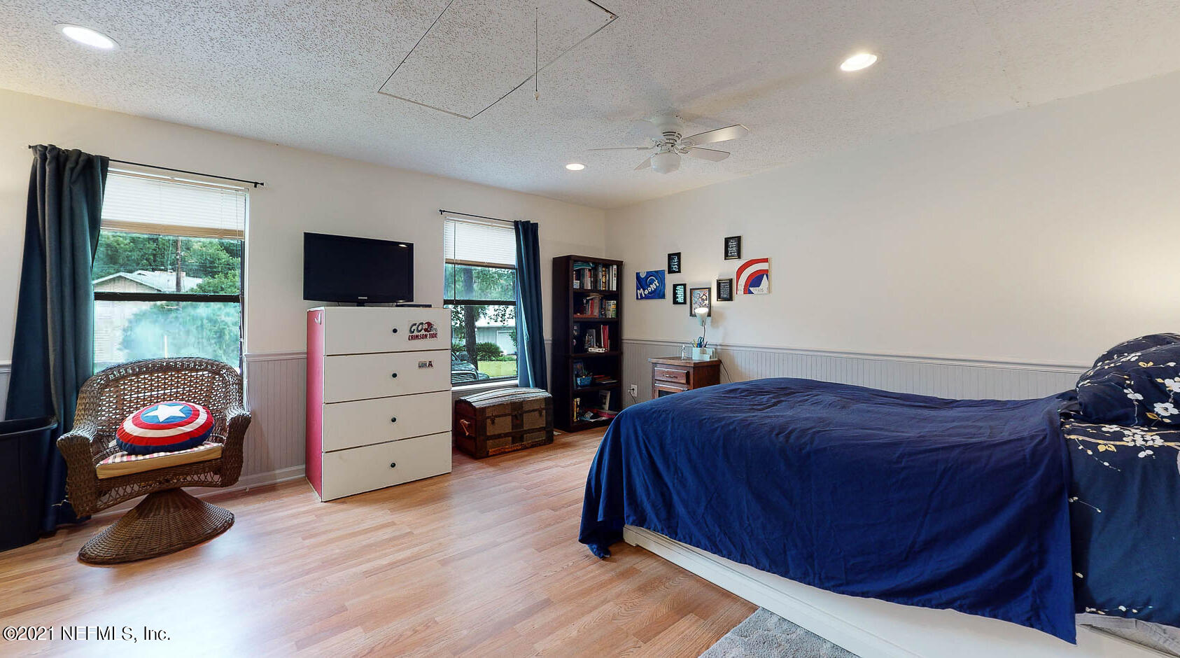 2053 Cornell Road Middleburg, FL 32068 - Photo 22 of 38 a bedroom with a bed and furniture