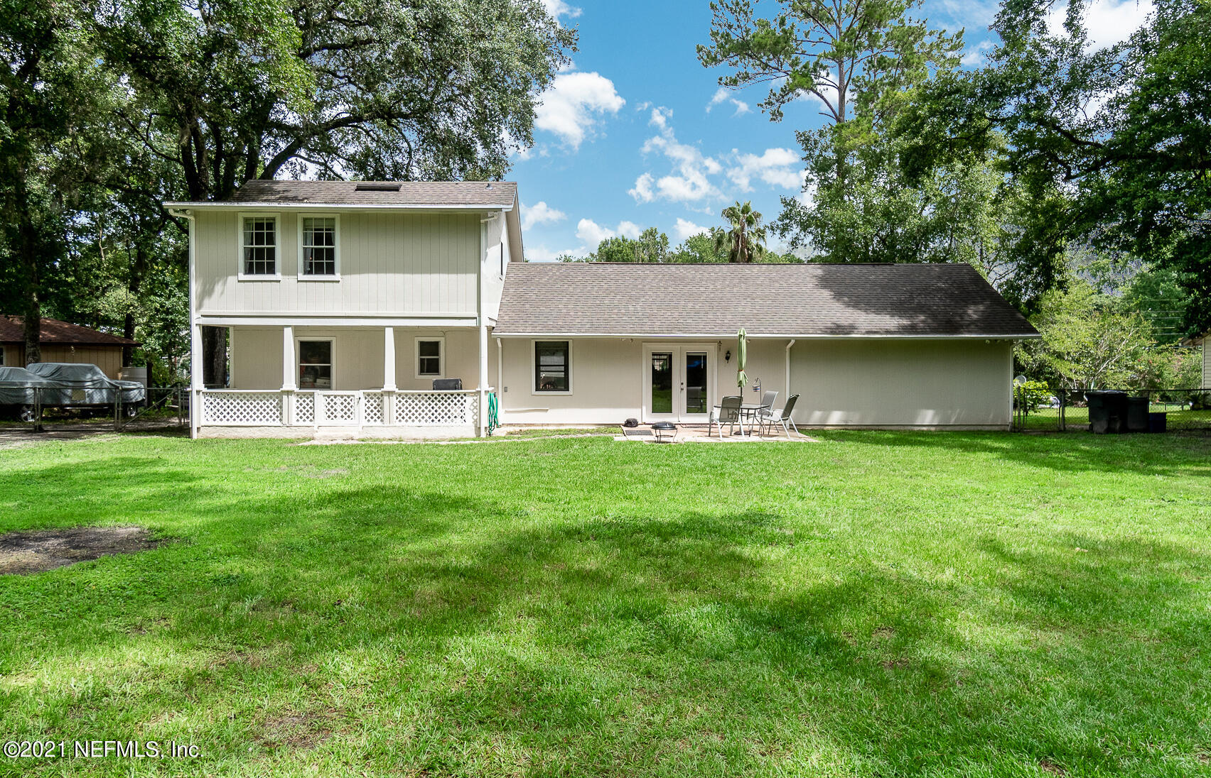 2053 Cornell Road Middleburg, FL 32068 - Photo 29 of 38 a front view of a house with a yard table and chairs