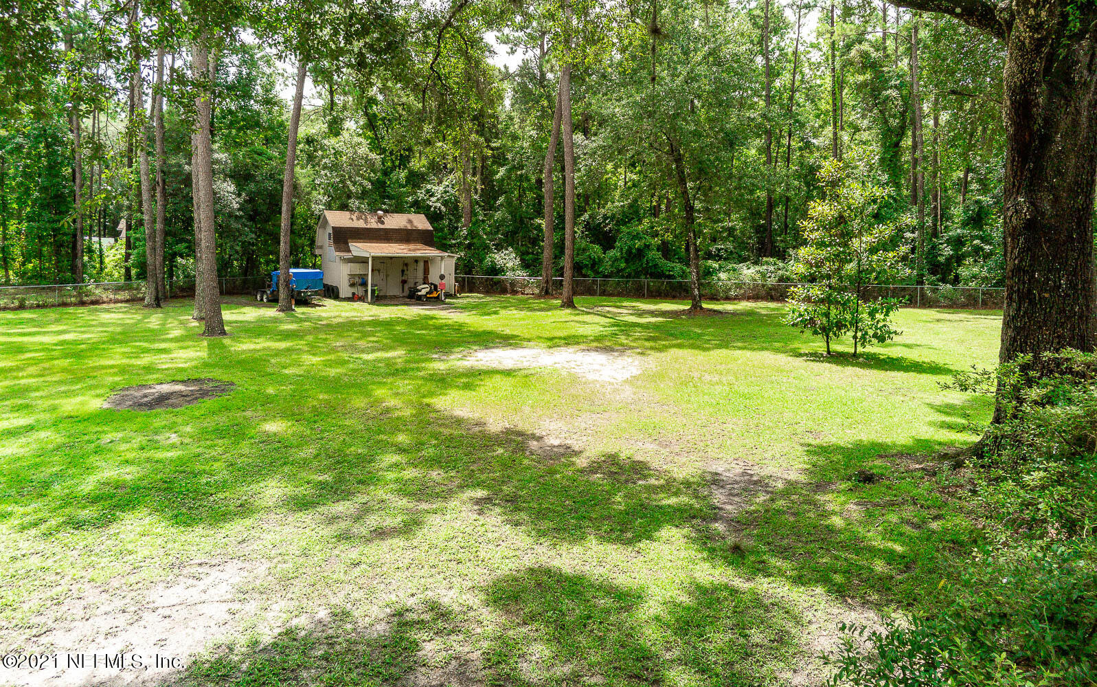 2053 Cornell Road Middleburg, FL 32068 - Photo 31 of 38 a view of a big yard with large trees