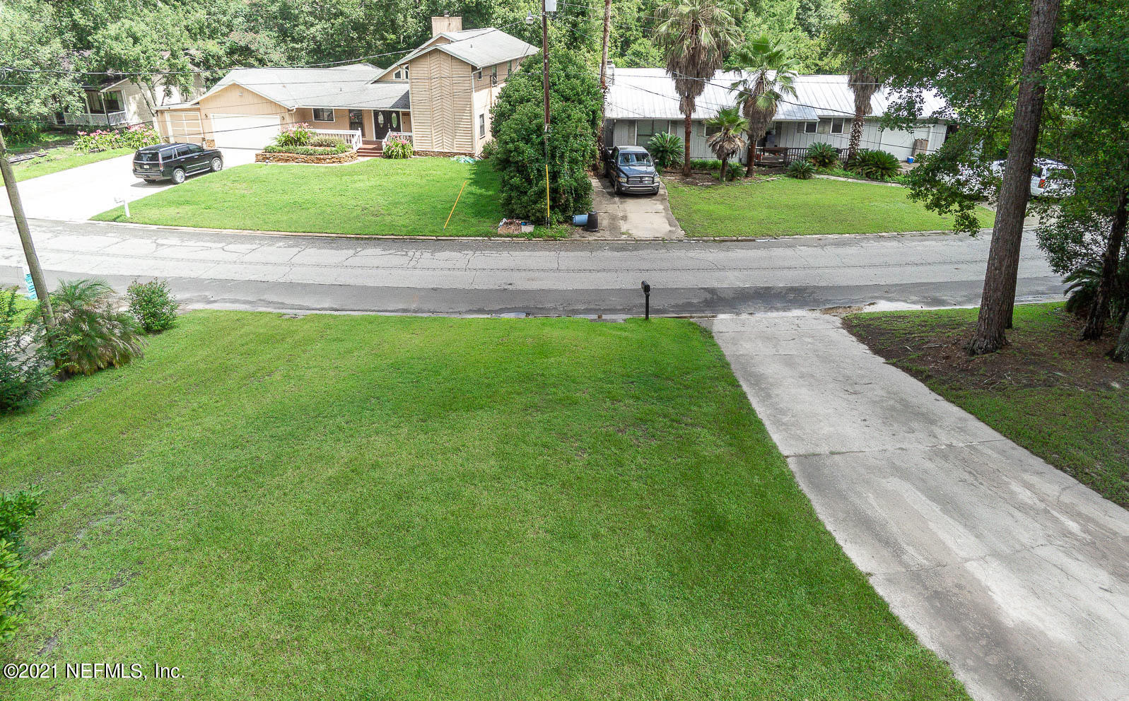 2053 Cornell Road Middleburg, FL 32068 - Photo 36 of 38 a front view of a house with a yard