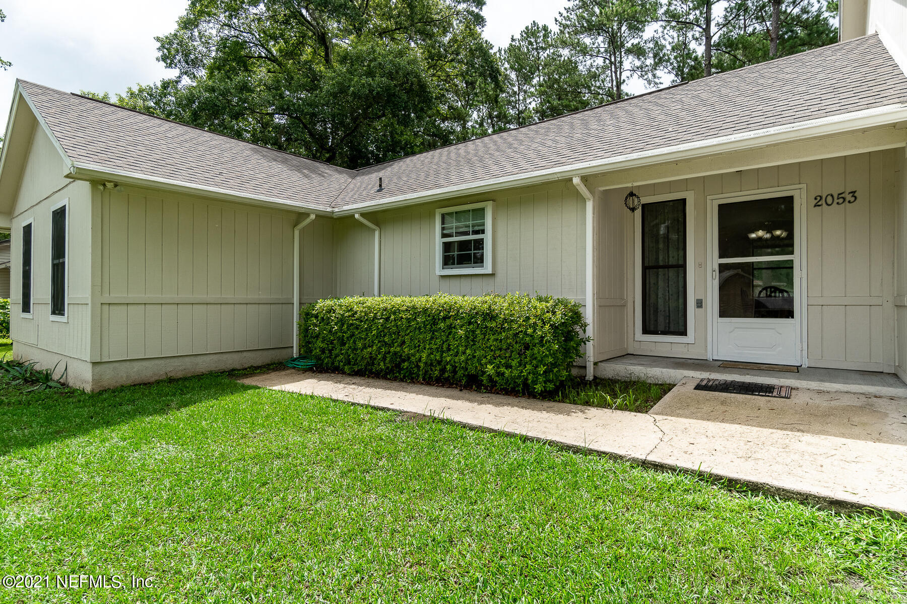 2053 Cornell Road Middleburg, FL 32068 - Photo 6 of 38 a view of a backyard with a garden