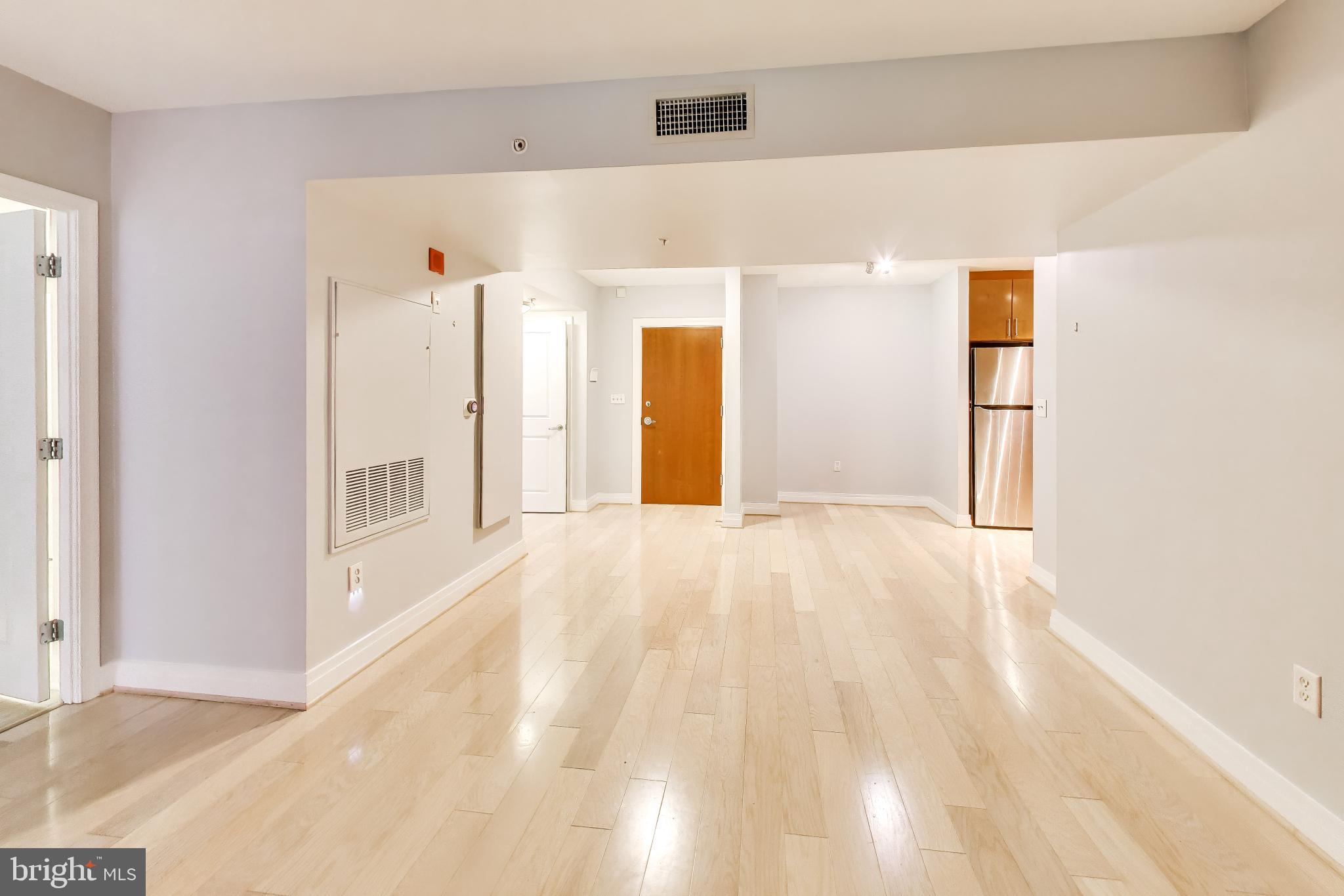 915 E Street Northwest, Unit 414 Washington, DC 20004 - Photo 9 of 35 a view of an empty room