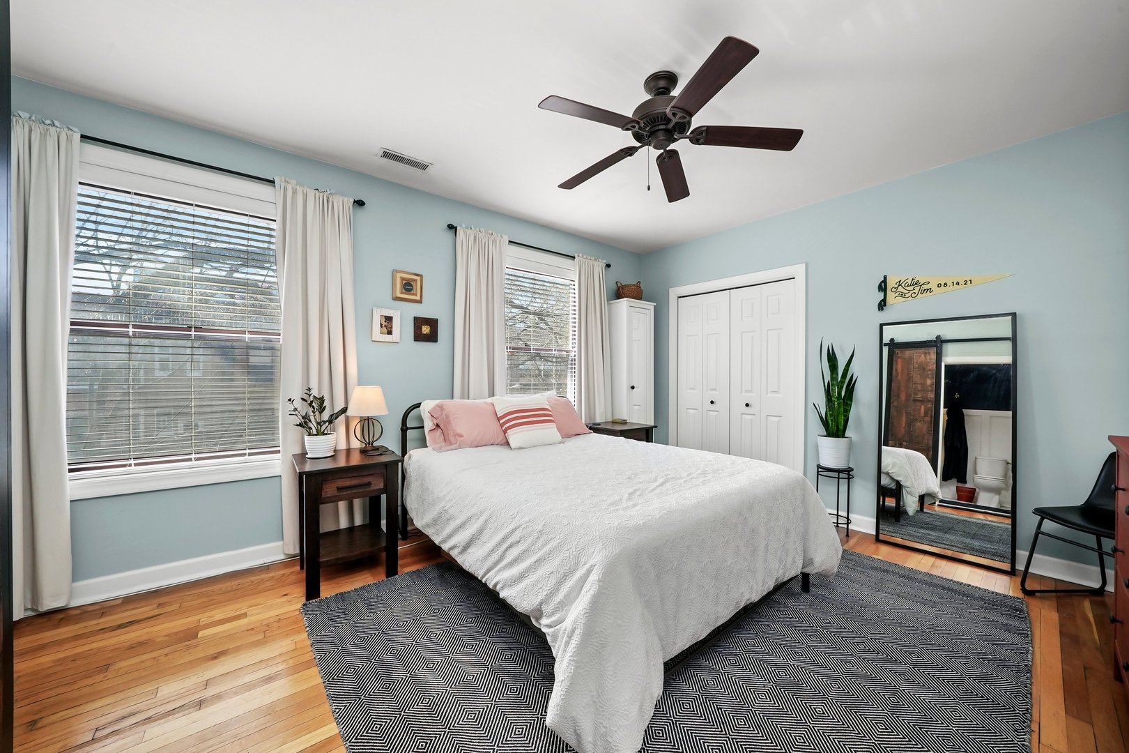 923 West Addison Street, Unit 2A Chicago, IL 60613 - Photo 5 of 9 a bedroom with a large bed and a window