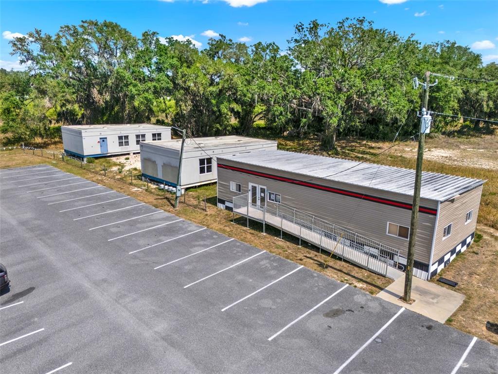 5765 Pit Road Bushnell, FL 33513 - Photo 28 of 35 a view of a terrace with trees