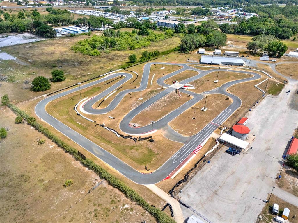 5765 Pit Road Bushnell, FL 33513 - Photo 32 of 35 an aerial view of a tennis court