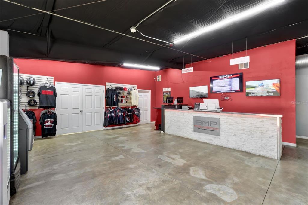 5765 Pit Road Bushnell, FL 33513 - Photo 5 of 35 a view of a garage with furniture