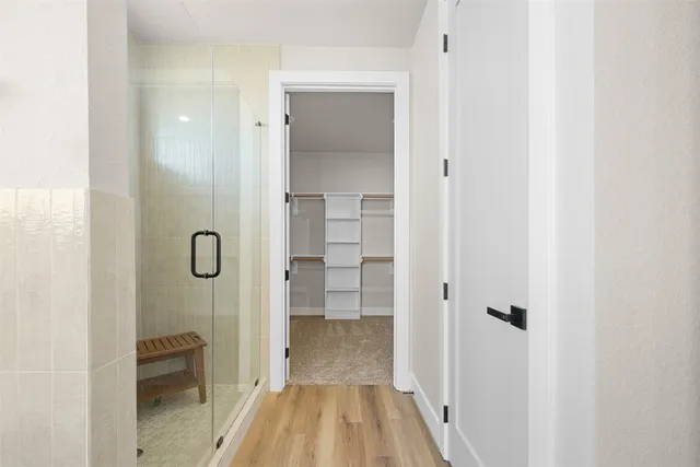 a bathroom with a sink and a shower