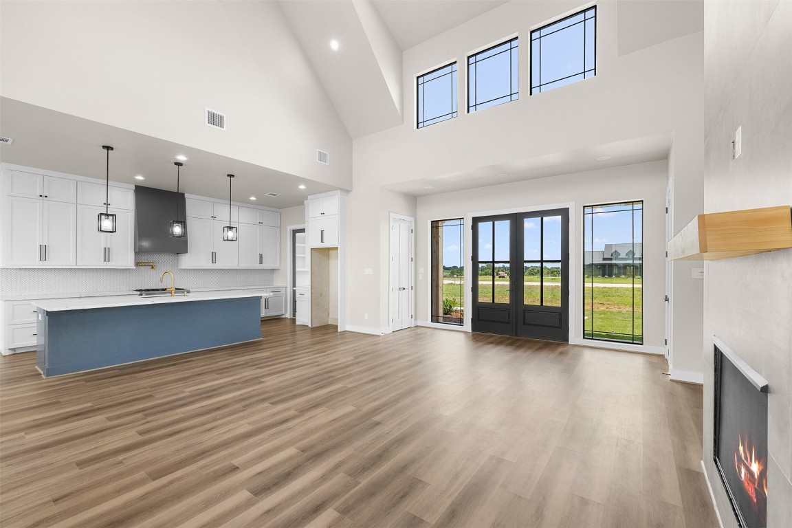 114 Country View Lane Road Schulenburg, TX 78956 - Photo 10 of 27 a large kitchen with stainless steel appliances a large window a oven and a large window