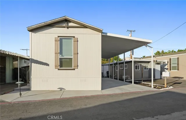 a front view of a house with a garage