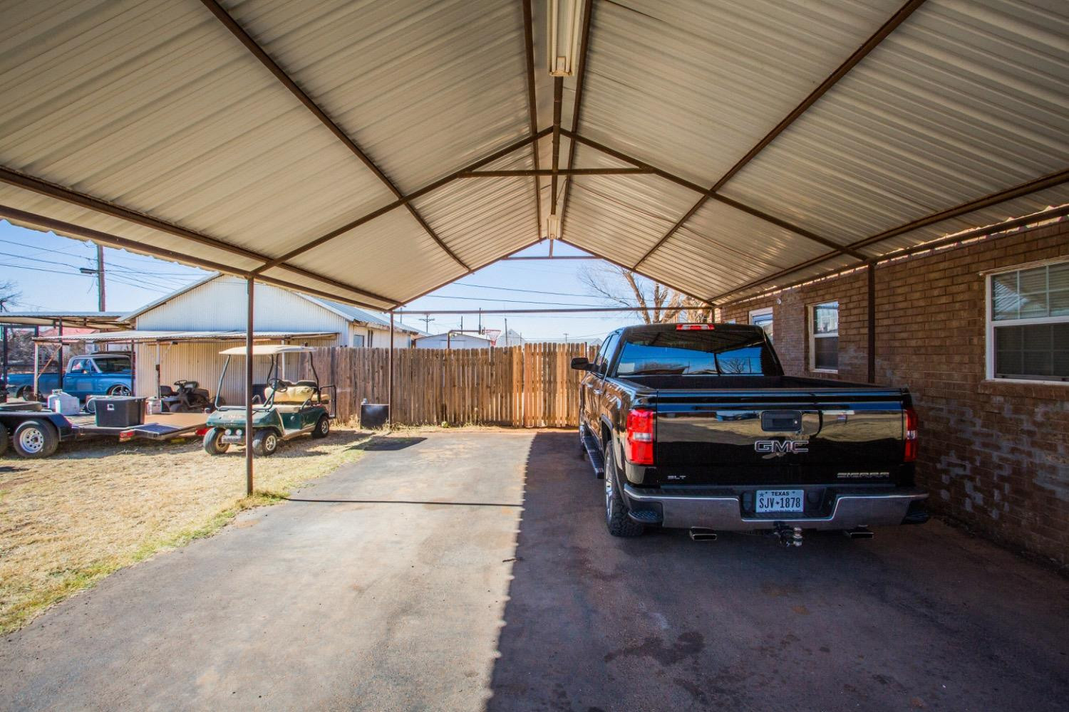 306 Terry Avenue Wellman, TX 79316 - Photo 30 of 32 a area with a table and chairs