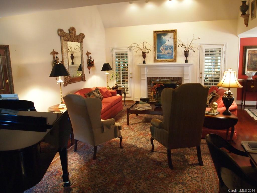 557 Cranborne Chase, Unit 16 Fort Mill, SC 29708 - Photo 3 of 23 a living room with furniture and a fireplace
