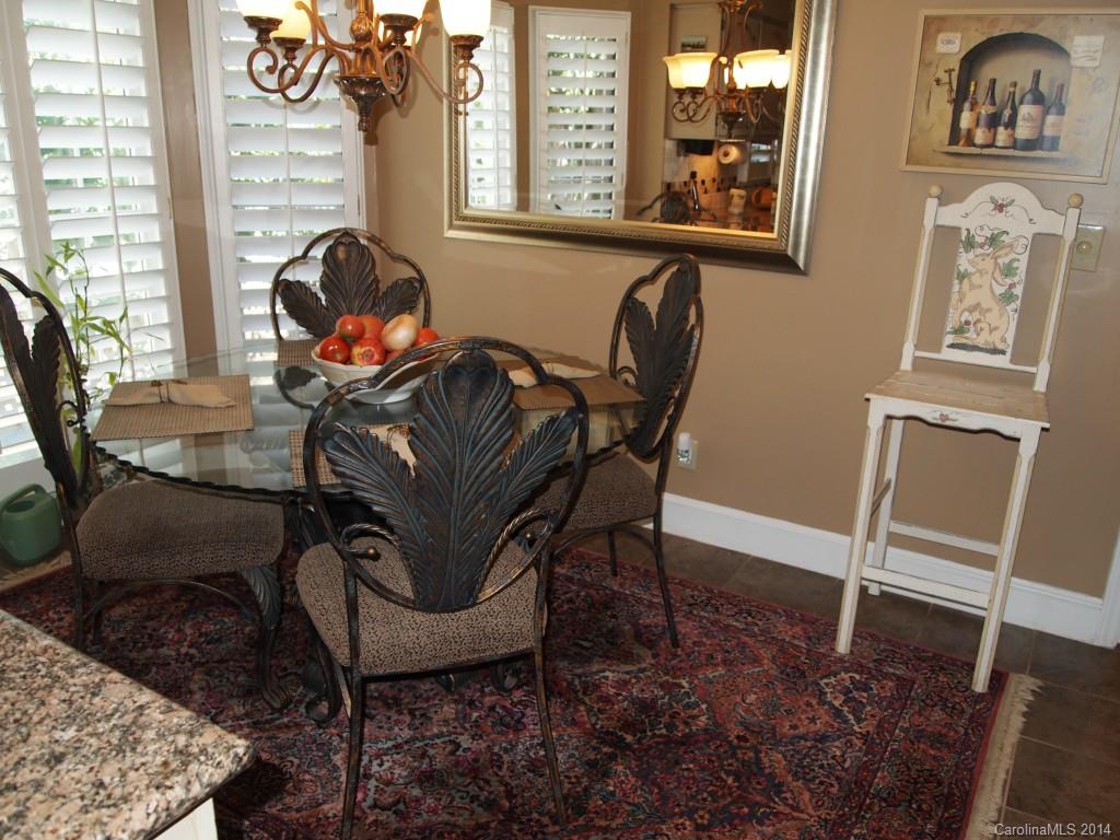557 Cranborne Chase, Unit 16 Fort Mill, SC 29708 - Photo 8 of 23 a view of a workspace with furniture and a window