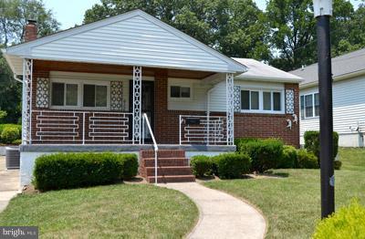 8106 Ridgely Oak Road Baltimore, MD 21234 - Photo 17 of 21 a view of a house with garden and yard
