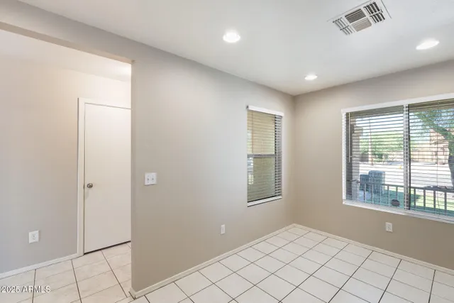 a kitchen with stainless steel appliances a refrigerator sink and microwave