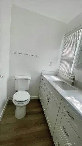 a bathroom with a sink and a toilet