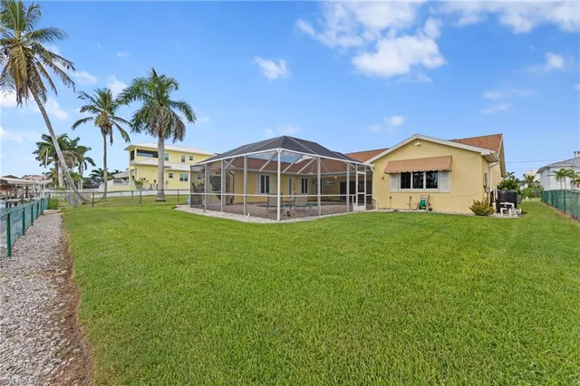 a view of a house with a big yard